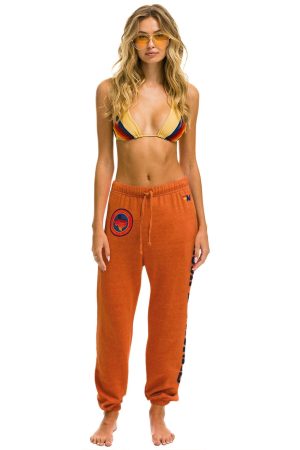 UNIVERSITY OF TEXAS UNISEX CIRCLE PRINT SWEATPANTS - BURNT ORANGE